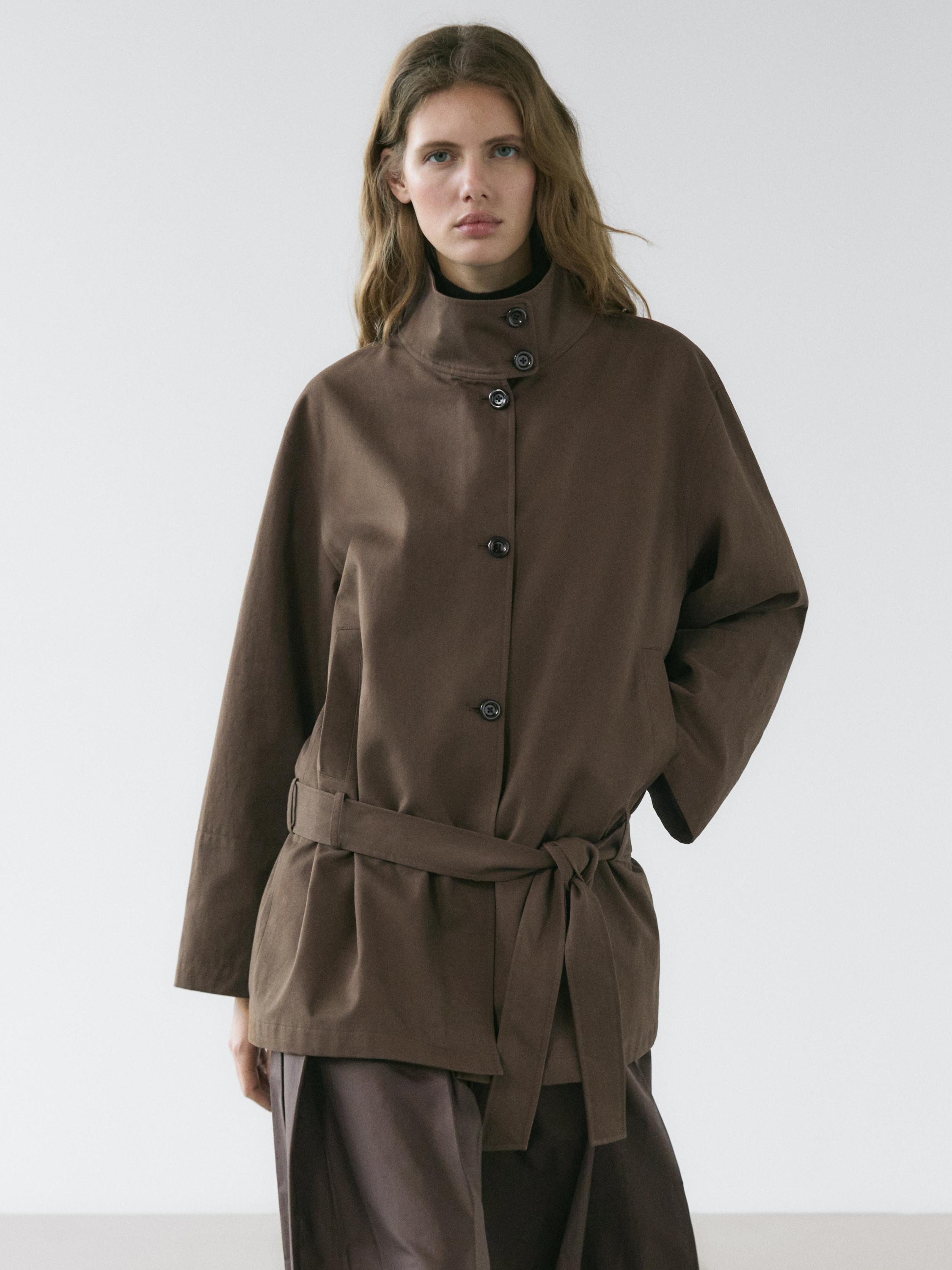 Mid-length trench coat with belt detail